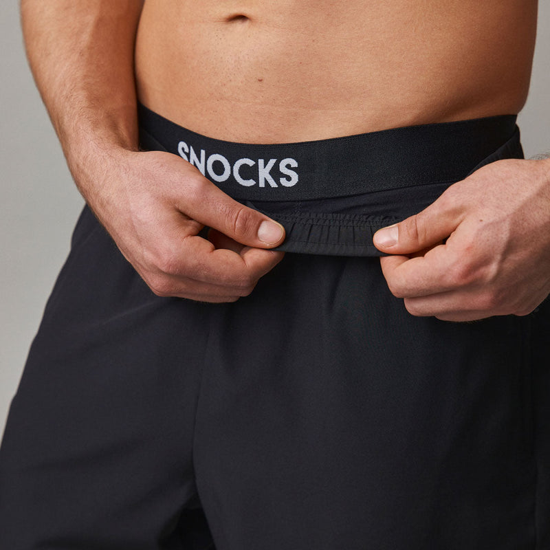 Pantaloncini sportivi corti uomo - Pantaloni - Vita elastica